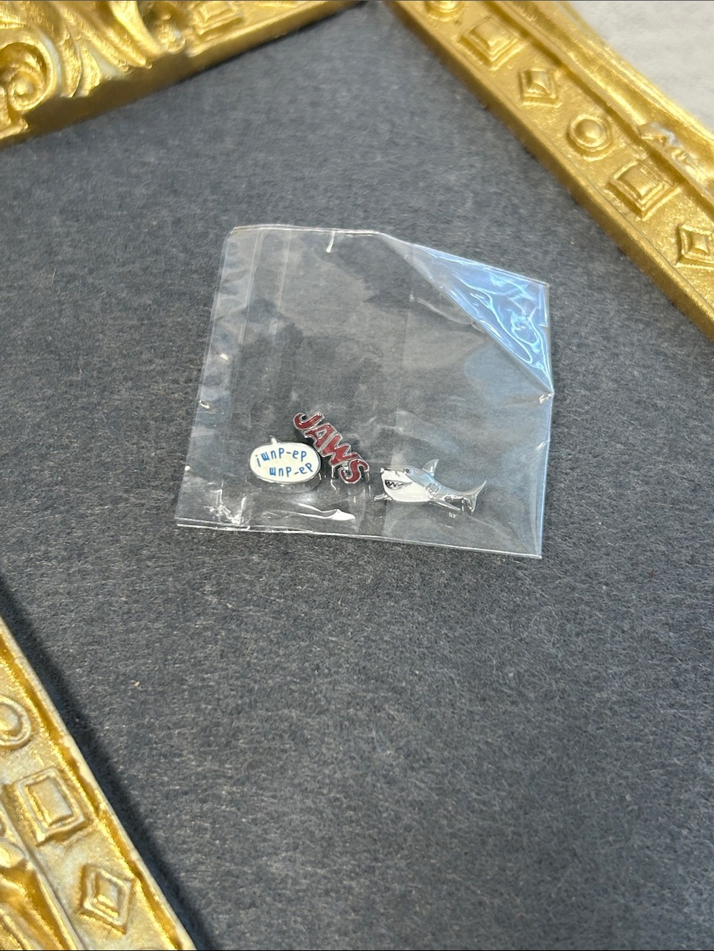 Origami Owl  and White/Red Jaws charms for lockets
